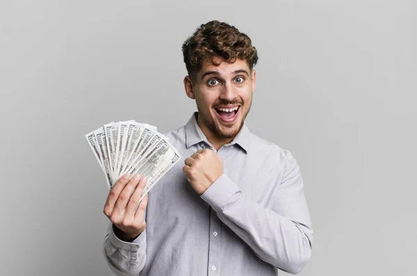 Young Adult Caucasian Man Feeling Happy Facing Challenge Celebrating Dollar — Stock Photo, Image