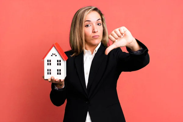 Pretty Blonde Woman Feeling Cross Showing Thumbs Real State Concept — Stockfoto