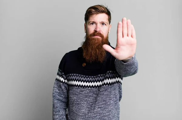 Long Beard Red Hair Man Looking Serious Showing Open Palm — Stock Photo, Image