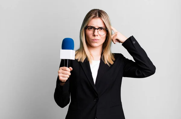 Young Pretty Woman Feeling Confused Puzzled Showing You Insane Presenter — Stock Photo, Image