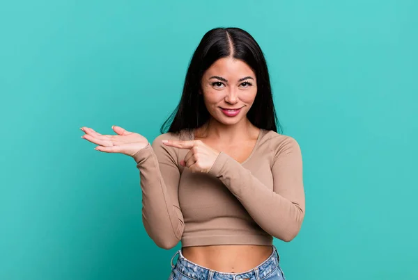 Pretty Latin Woman Smiling Cheerfully Pointing Copy Space Palm Side — Stock Photo, Image