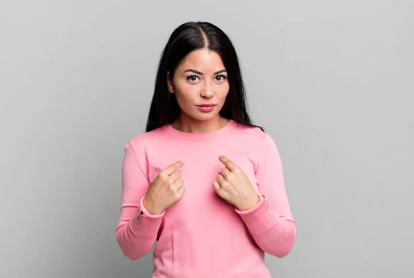 Pretty Latin Woman Pointing Self Confused Quizzical Look Shocked Surprised — Stockfoto