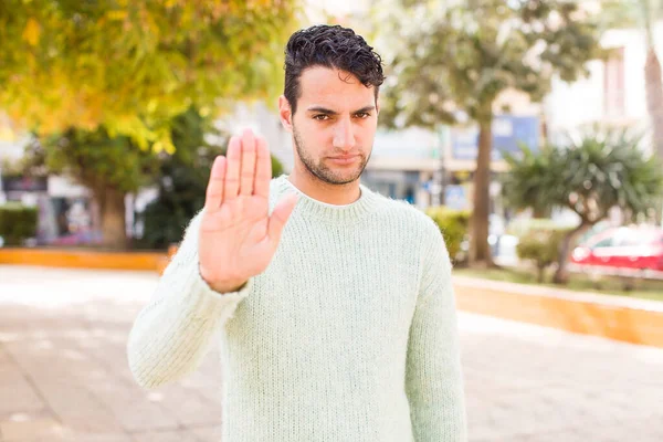 Young Hispanic Man Looking Serious Stern Displeased Angry Showing Open — Stock Photo, Image