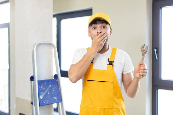 Young Handsome Man Covering Mouth Hand Shocked Surprised Expression Handyman — Stock Photo, Image