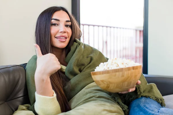 Young Pretty Woman Eating Popcorns Sitting Couch Home —  Fotos de Stock