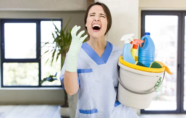 Young Pretty Woman Looking Desperate Frustrated Stressed Housekeeper Concept — Stockfoto