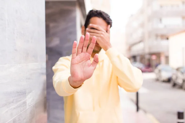 Young Hispanic Man Covering Face Hand Putting Other Hand Front — Stock Photo, Image