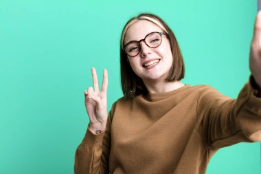 young pretty expressive woman with a copy space