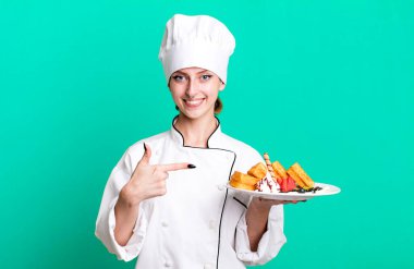 caucasian pretty blonde woman. chef concept and waffles