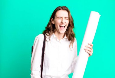 young pretty woman shouting aggressively, looking very angry. architect concept