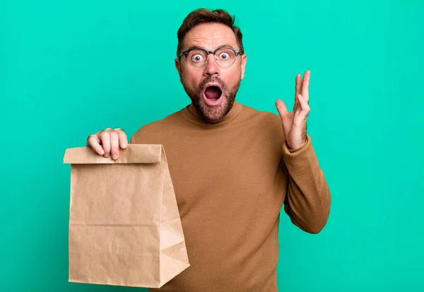 Middle Age Man Feeling Extremely Shocked Surprised Take Away Paper — Stock Photo, Image