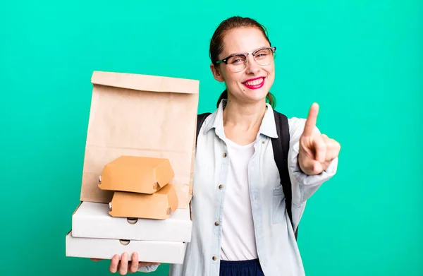 Pretty Hispanic Woman Smiling Proudly Confidently Making Number One Delivery — Stock Photo, Image