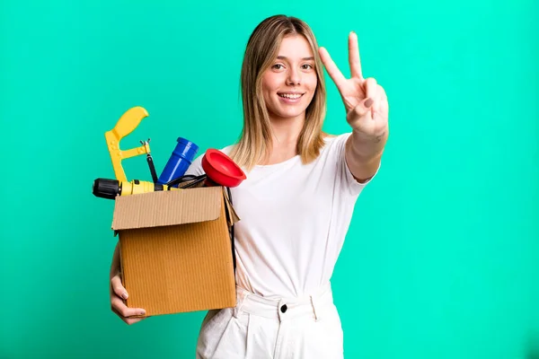 Young Pretty Woman Smiling Looking Friendly Showing Number Two Toolbox — Stock Photo, Image