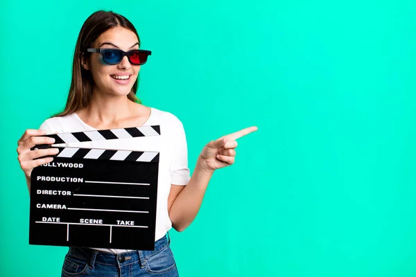 Young Pretty Woman Looking Excited Surprised Pointing Side Cinema Film — Stock Photo, Image