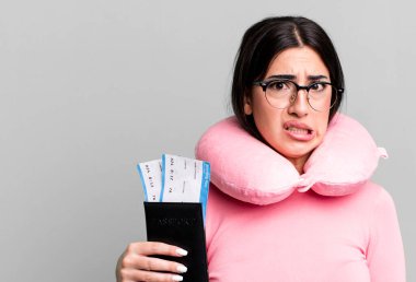 looking puzzled and confused. flight passenger concept