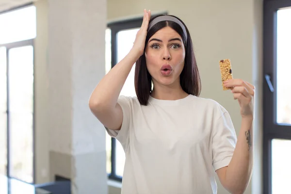 Pretty Young Woman Feeling Extremely Shocked Surprised Fitness Cereal Bar — Stock Photo, Image