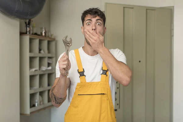 Young Handsome Man Covering Mouth Hand Shocked Surprised Expression Handyman — Stock Photo, Image