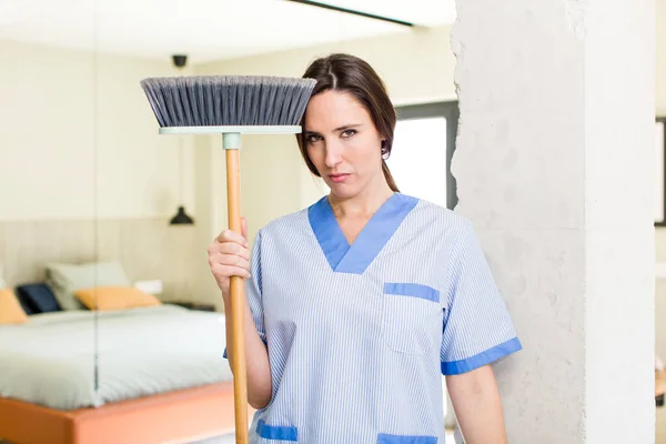Young Pretty Woman Feeling Sad Upset Angry Looking Side Housekeeper —  Fotos de Stock