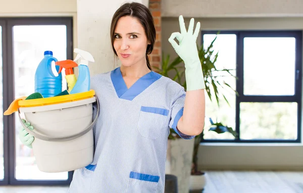 Young Pretty Woman Feeling Happy Showing Approval Okay Gesture Housekeeper — Stock Photo, Image