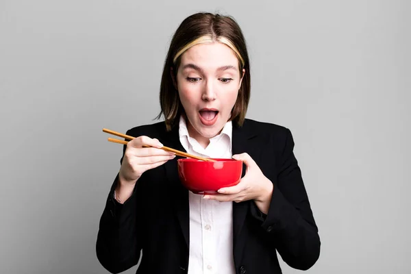 Young Pretty Businesswoman Eating Ramen Noodles Bowl — Stockfoto