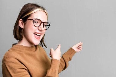 young pretty expressive woman with a copy space