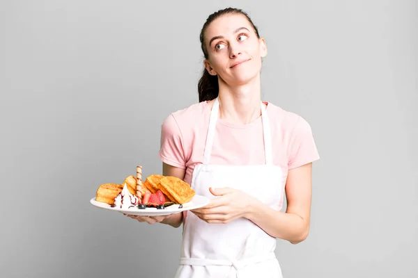 Young Pretty Woman Shrugging Feeling Confused Uncertain Waffles Concept — Stock Photo, Image