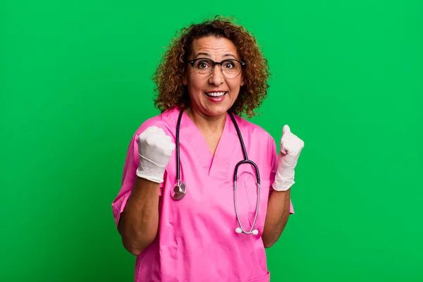 Pretty Middle Age Woman Feeling Shocked Laughing Celebrating Success Nurse — Stock Photo, Image