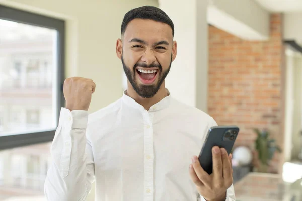 Young Adult Man Feeling Shocked Laughing Celebrating Success Smartphone Concept — Stock Photo, Image