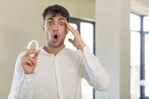 Young Handsome Man Looking Happy Astonished Surprised Dental Retainer Concept — Stock Photo, Image