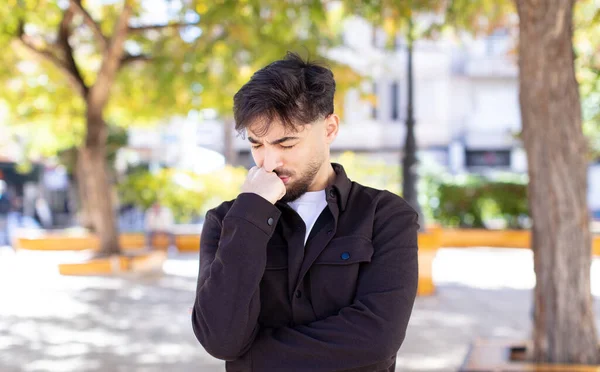 Young Handsome Man Feeling Serious Thoughtful Concerned Staring Sideways Hand — Stock Photo, Image