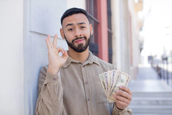 Young Adult Man Feeling Happy Showing Approval Okay Gesture Dollar — Stock Photo, Image