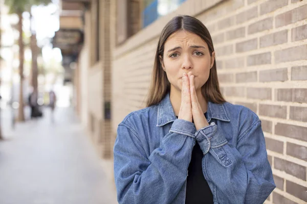 Young Pretty Woman Feeling Worried Hopeful Religious Praying Faithfully Palms — Stock Photo, Image