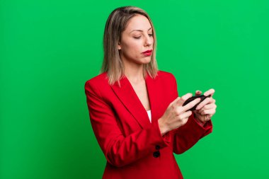 young pretty businesswoman using her smart phone