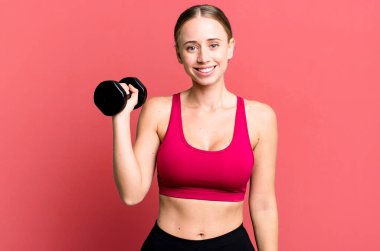 blonde pretty young caucasian woman fitness concept