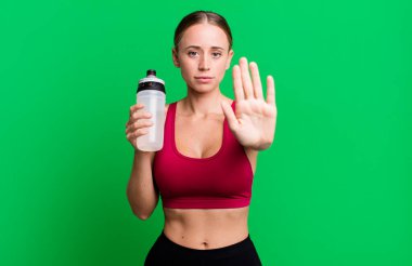 blonde pretty young caucasian woman fitness concept