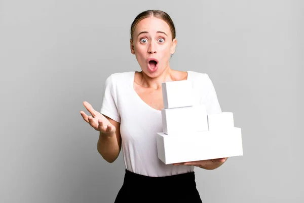 Caucasian Pretty Woman Feeling Extremely Shocked Surprised White Boxes Packages — Stock Photo, Image