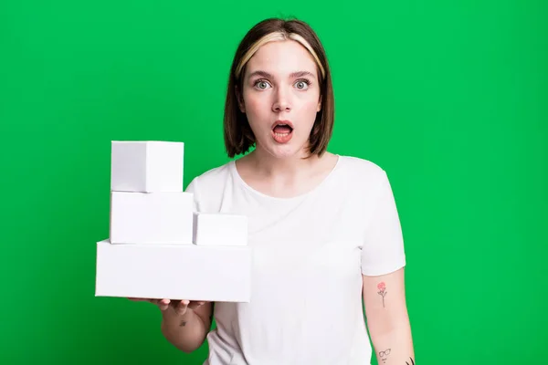 Young Pretty Woman Looking Very Shocked Surprised White Blank Boxes — Stock Photo, Image