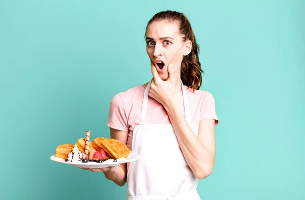 Young Pretty Woman Mouth Eyes Wide Open Hand Chin Waffles — Stock Photo, Image