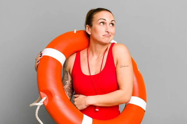 Young Pretty Woman Shrugging Feeling Confused Uncertain Summer Lifeguard Concept — Stock Photo, Image