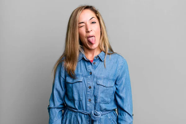Blonde Adult Woman Cheerful Carefree Rebellious Attitude Joking Sticking Tongue — Stockfoto