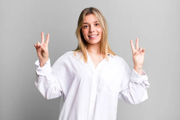 Blonde Pretty Woman Smiling Looking Happy Friendly Satisfied Gesturing Victory — Stock Photo, Image