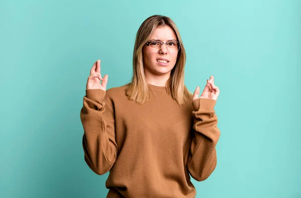 Blonde Pretty Woman Crossing Fingers Anxiously Hoping Good Luck Worried — Stock Photo, Image