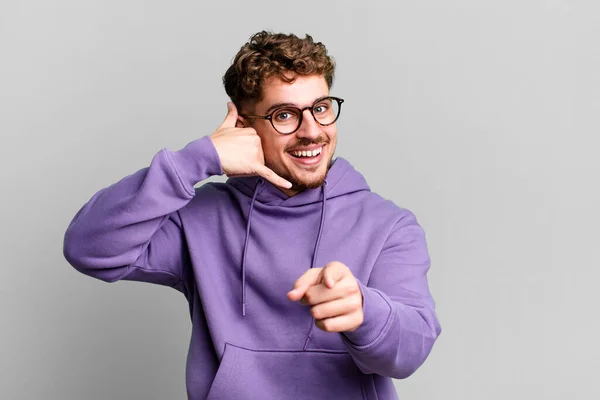 Young Adult Caucasian Man Smiling Cheerfully Pointing Camera While Making — Stock Photo, Image
