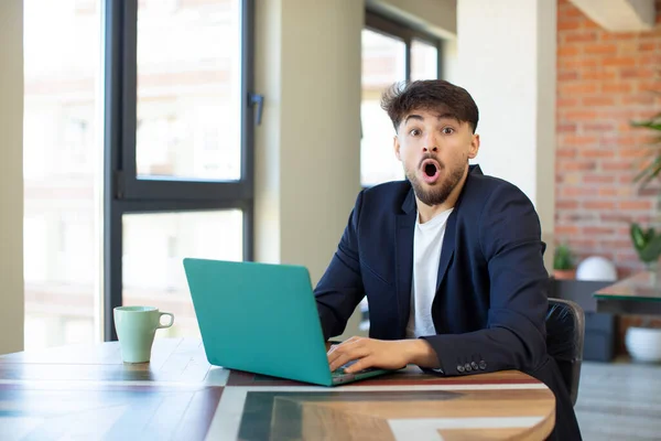 Young Handsome Man Feeling Extremely Shocked Surprised Freelance Concept Laptop — Stock Photo, Image