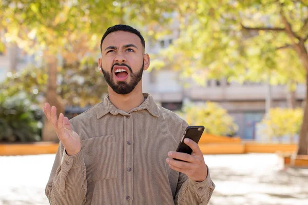 Young Adult Man Screaming Hands Air Using Smartphone Concept — Stock Photo, Image