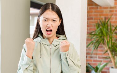 asian pretty woman at new home interior