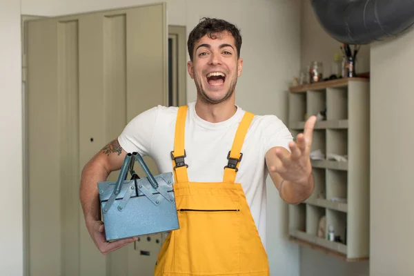 Young Handsome Man Smiling Happily Offering Showing Concept Handyman Concept — Stock Photo, Image