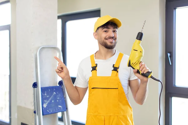 Young Handsome Man Smiling Cheerfully Feeling Happy Pointing Side Handyman — Stock Photo, Image