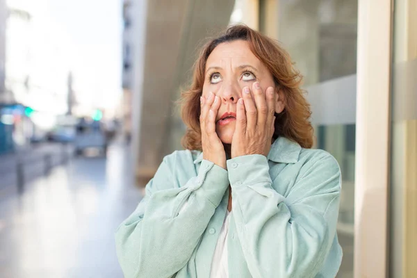 Middle Age Woman Feeling Shocked Scared Looking Bored Hands Cheeks — Stock Photo, Image