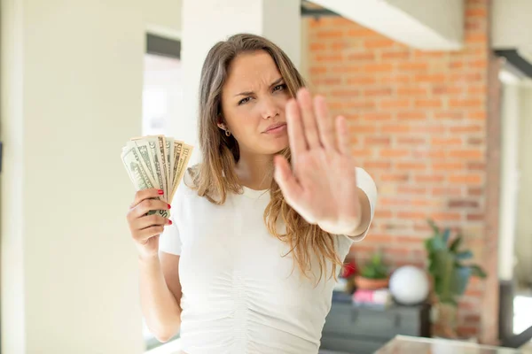 Pretty Woman Looking Serious Showing Open Palm Making Stop Gesture — Stockfoto